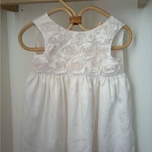 Elegant White Dress with Floral Accents